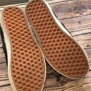 Classic Vans slip on shoes.